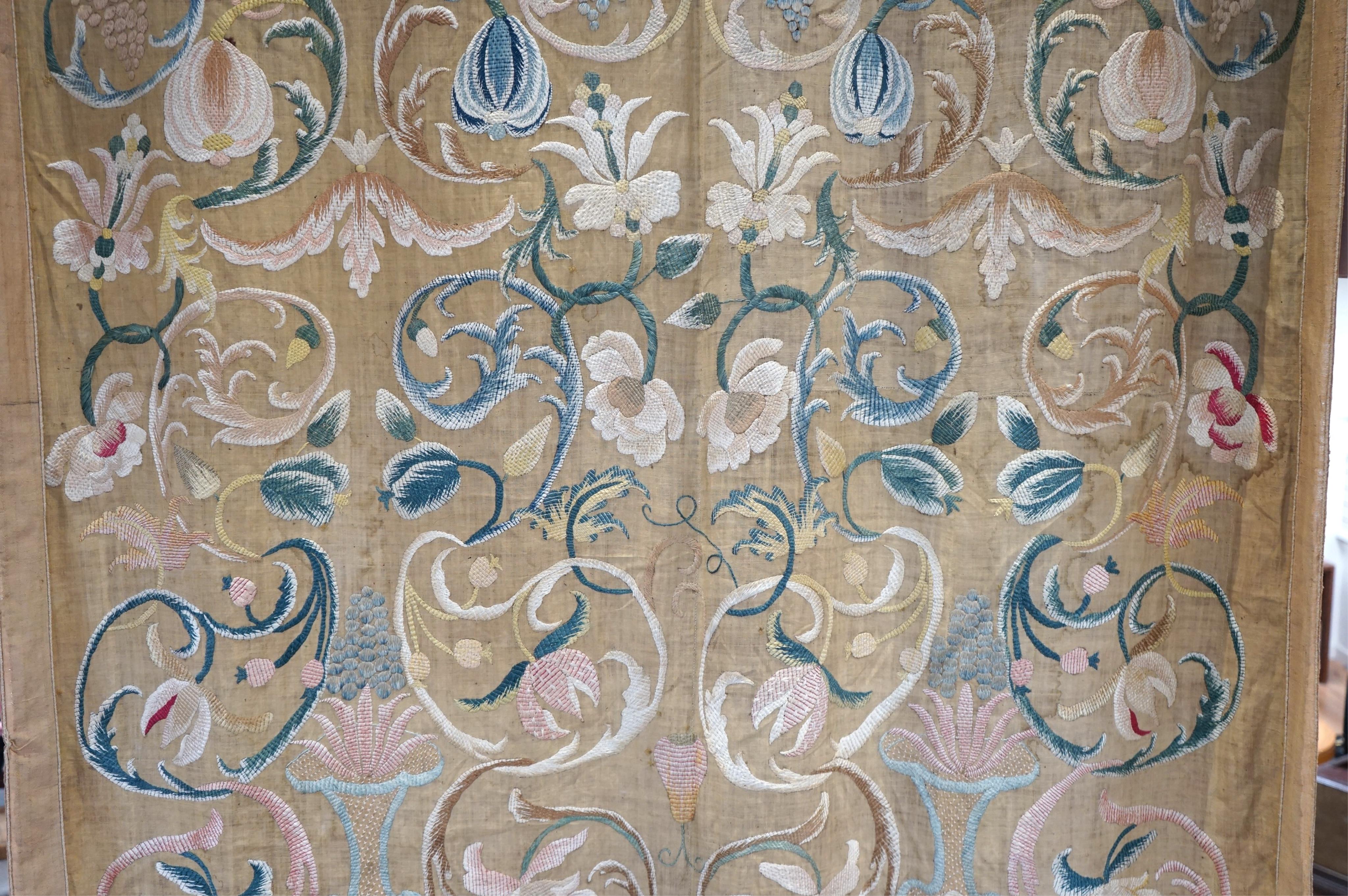 A large pair and one smaller panel of late 18th century Italian silk floss hand embroidered panels, possibly from Florence or Venice, both known for floss embroidery. Thought to be originally sacristy hangings. Elaborate
